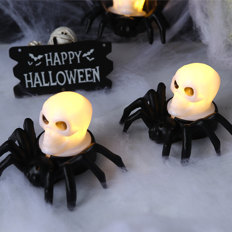 Vela electrónica LED en forma de araña y ojo